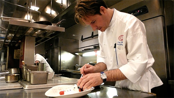 Craig Hopson plating something very fancy at Le Cirque.