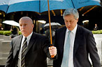 Why Can’t Jamie Dimon Hold His Own Umbrella?