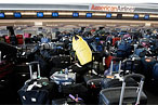 You Know That Thing You’re Afraid Happens to Your Luggage After You Check It?