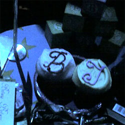 Two lonely cupcakes in the dark tent, begging for our love.