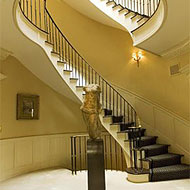 It's bad enough that some other people in New York get to have stairs in their apartments. But twisty ones? We're gonna hurl.
