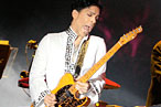 Prince Plays Guitar Hero on New Tracks