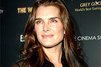 Brooke Shields Promotes Sunscreen; Catherine Zeta-Jones Brushes Her Teeth With Strawberries