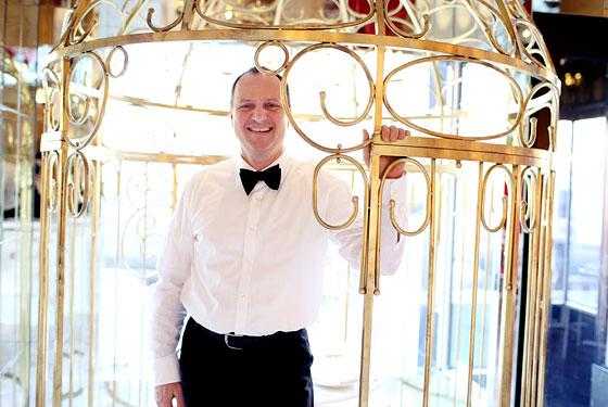 Waiter J.P. Behar in the birdcage at Sweetiepie.