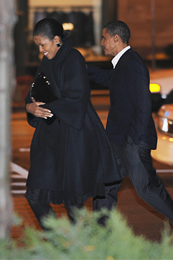 The newly elected Barack Obama leaving Spiaggia with Michelle on November 8, 2008.
