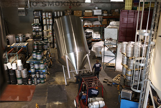 A vat is installed in the Greenpoint brewery.