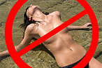 Topless Sunbathing OUT in France