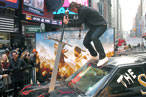 Man With Giant Sword Destroys SUV in Times Square