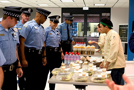 There's no way these Chicago cops were happy that this was a healthy-eating challenge. We know we weren't.