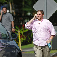 Secret Service agents rush to the presidential motorcade.