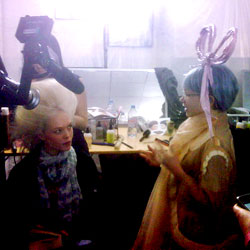 Tavi interviewing model Siri Tollerød backstage at Christian Dior couture.