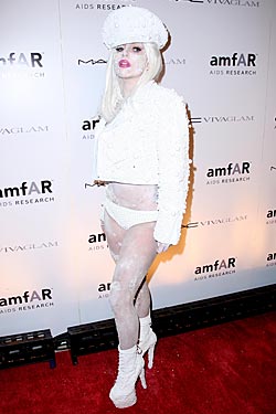 Gaga, in white at last week's amfAR gala.