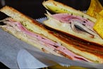 Bobby Flay Rides the PATH for a Cuban-Sandwich Throwdown