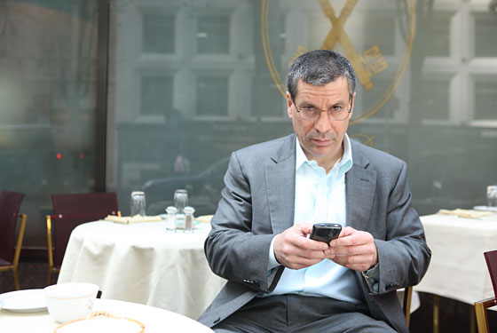 Gasparino checks his BlackBerry over lunch at San Pietro.