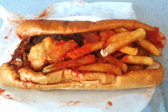 And Now, a Sandwich Stuffed With Cheesesteak, Cheese Sticks, Chicken Fingers, and Fries