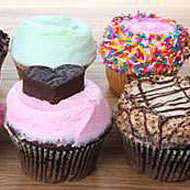 Catfight: Magnolia’s Carrie Cupcake vs. Crumbs’ Cosmo Cupcake