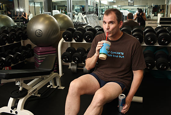 Bruni sips his Peanut Butter Split and Red Bull at the gym.