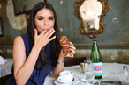 Lee snacks on a croissant at Ballato.