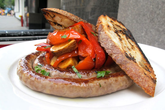 Housemade cheese-and-parsley ring sausage.