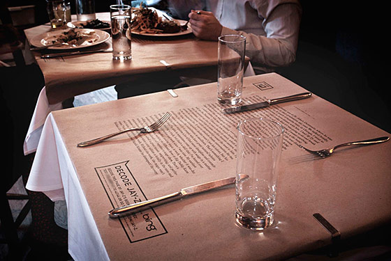 Jay-Z’s Memoir Pops Up on Takeout Menus, Tablecloths, and Pizza Boxes