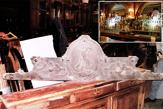 A sign carved with the name of August Lüchow is for sale. Inset: The bar at Café Remy.