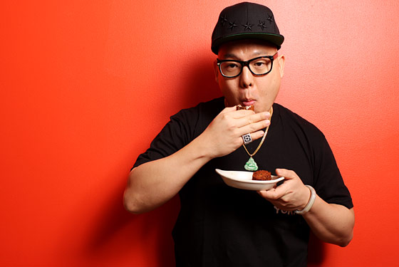 Huang, fighting a hangover to eat some falafel.