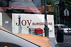 The new Joy Burger, as seen from a moving vehicle.