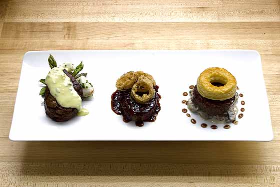 
Plated are filet oscar, filet au poive, and beef wellington.
