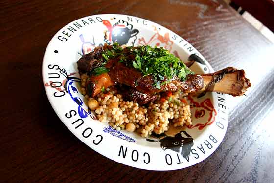 
Stinco di agnello (braised lamb shank served with couscous).