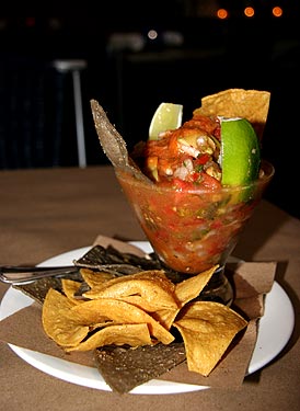 
La Palapa; Cevice de camarones picosito (Veracruz-style shrimp cooked in lime with avocado, olives, capers, tomatoes and chile tomato salsa)