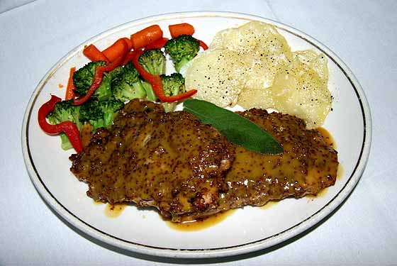 
  The chicken breast is coated with pecans in a honey mustard sauce for $14.95.
