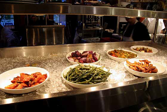 
Assorted dishes on a display of ice.
